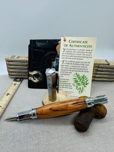 Penna stilografica fatta - , a