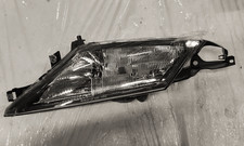 46469877 Proiettore SX LANCIA