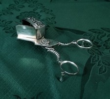 SMOCCOLATOIO SPEGNI CANDELE TAGLIA STOPPINO IN ARGENTO PLACCATO CESELLO XIX sec.
