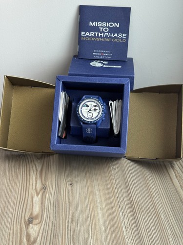 Swatch omega mission the - omega,