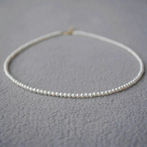Collana perle bianche - di,