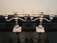 Coppia di candelabri decorati