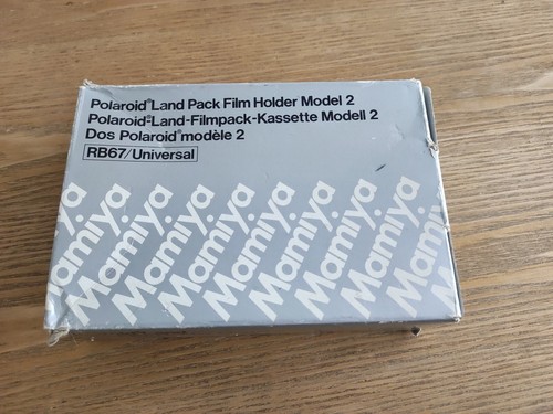 Near mint mamiya polaroid - mint],