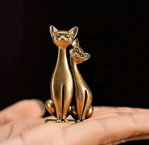 Statuina gatto amante coppia