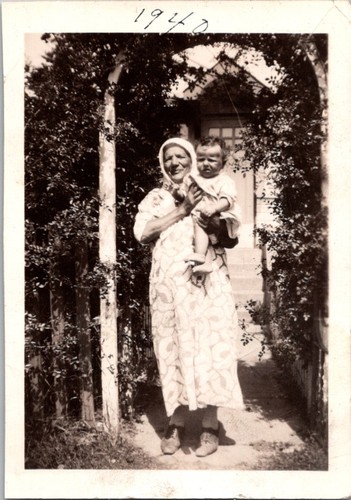 Grandmother holding baby 1940 - holding,