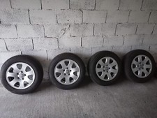 Cerchi in lega originali Audi con gomme invernali 195/65/15 seminuove