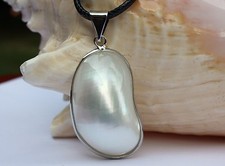 P058 Guscio Madreperla Perle