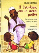 Il bambino con le mani pulite. . Babakar Mbaye Ndaak. 2014. .