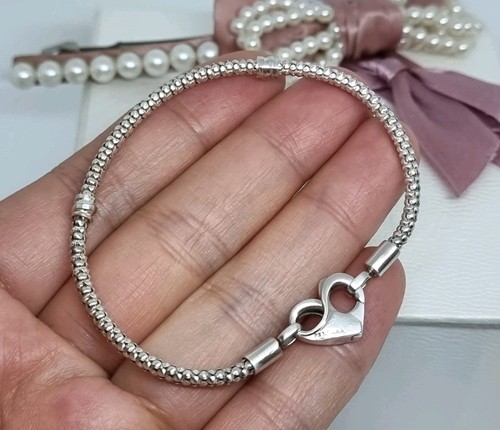 Bracciale catena borchiata