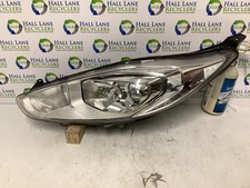 Faro proiettore anteriore lato