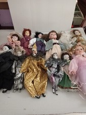 lotto collezione  12 bambole  ceramica