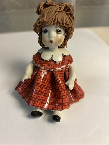 Statuina bambola capelli