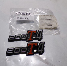 FREGIO TARGHETTA "200T4" IN PLASTICA PER PIAGGIO GILERA TG1 (CONFEZIONE 2 PEZZI)