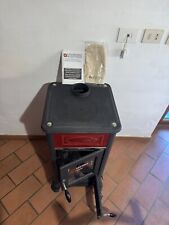 Stufa NORDICA a legna, nuova, nera.