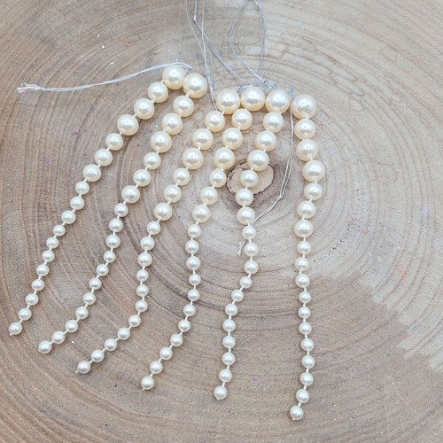 Stock fili perle crema - stock,