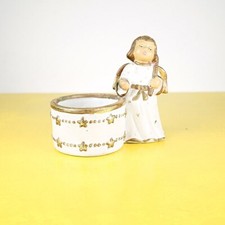 angelo porta candela natalizia