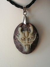 Vecchio pendente in pietra Tzi Pao testa dragone