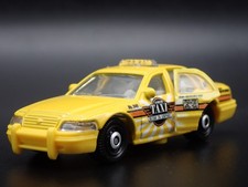 Modello Auto Diecast In Scala 1:64 Taxi Cab Giallo Ford Crown Victoria 1998-2012