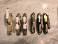 MANIGLIA CREMONESE GIGLIO PER FINESTRE CON 2 FORI LATERALI IN OTTONE BRONZATO 