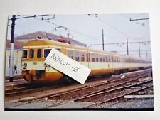 Fotografia Elettromotrice ALe801 e rimorchi a Nizza Monferrato 7 Marzo 1989