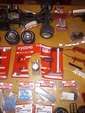 Modellino ferrari F1 a scoppio  con vari pezzi di ricambio.