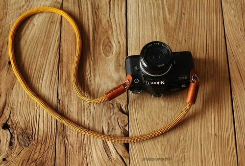 Cinghia per fotocamera - , in