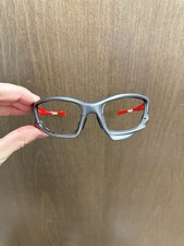 Giacca Oakley Split montatura grigio/rosso lucido