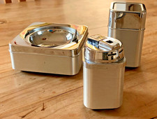 SET VINTAGE-POSACENERE PORTASIGARETTE-ACCENDINO IN ACCIAIO-IMPOSTA FABBRICAZIONE