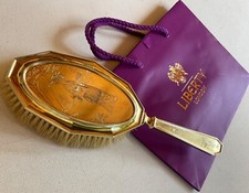 Spazzola Argento Londra inizi