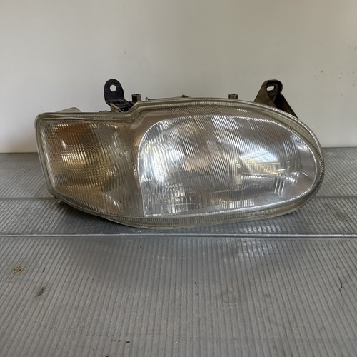 Faro anteriore ford - anteriore, escort
