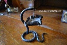 Antico porta orologio a forma di serpente in ferro battuto XX secolo