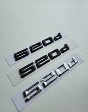 Emblema 520d nero