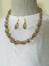 Collana cristalli briolette 15x9 giallo citrino con orecchini Invio x raccomanda