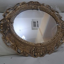specchio ovale con cornice in legno Oro