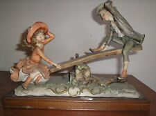 GIUSEPPE ARMANI - Bimbi che giocano sull'asse