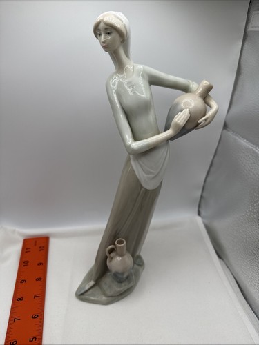 Lladro girl with - 12.5", jug
