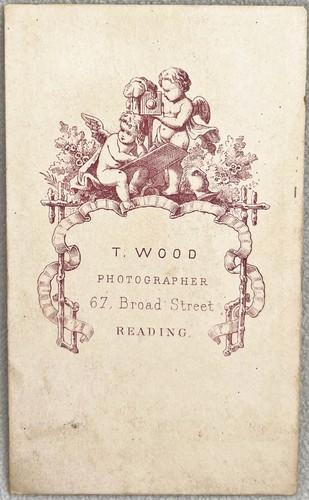 Cdv wood reading cherub - wood,