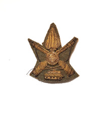 Fregio stemma berretto