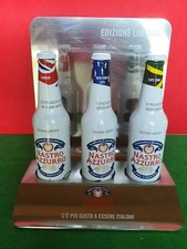 ESPOSITORE  E TRE BOTTIGLIE