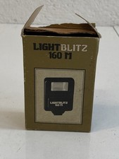 LightBlitz 160M flash vintage GN16, 2xAA, hot shoe, con scatola, Hong Kong