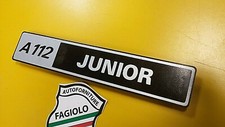 SCRITTA "A112 JUNIOR" LOGO BADGE FREGIO FANALE POST.STEMMA AUTOBIANCHI 5^S. A112