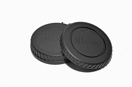 Corpo fotocamera tappo
