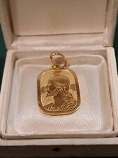 Medaglietta in oro 18Kt.con Cristo