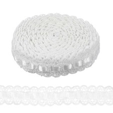 Bordo in pizzo con occhielli