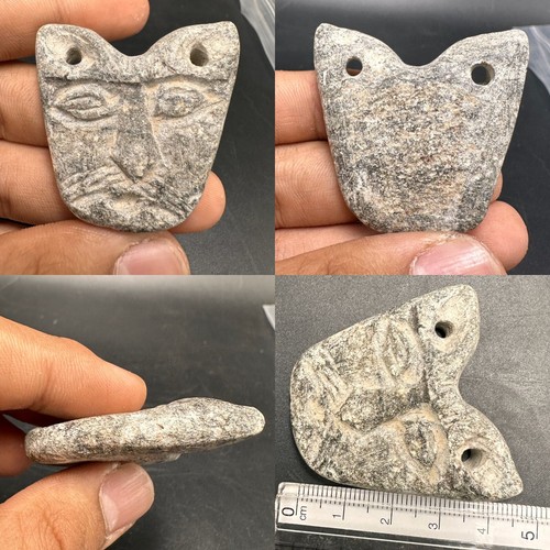 Antico amuleto testa - di, leone