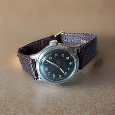 Orologio da polso svizzero vintage raro Eldor Geneve militare nero carica manuale brevetto GWO