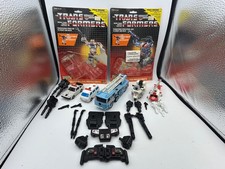 Transformers 1986 Combiners Defensor vintage completo al 100% con 2 cartoncini/bolle