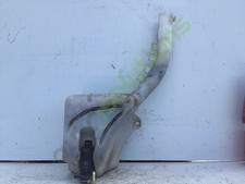 Bottiglia e motore lavatrice