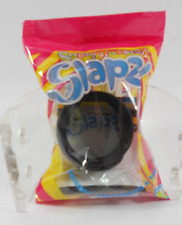  BRACCIALETTO NERO  SHOKKY BANDZ SLAPZ  A " POPSTAR" REGALINI FESTE COMPLEANNO