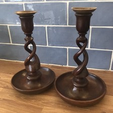 Coppia di candelabri in legno